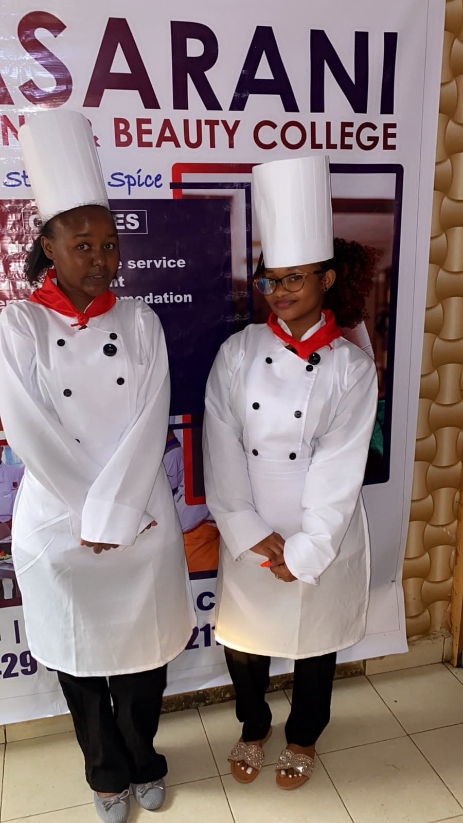 Culinary students in chef whites at the KCBC campus