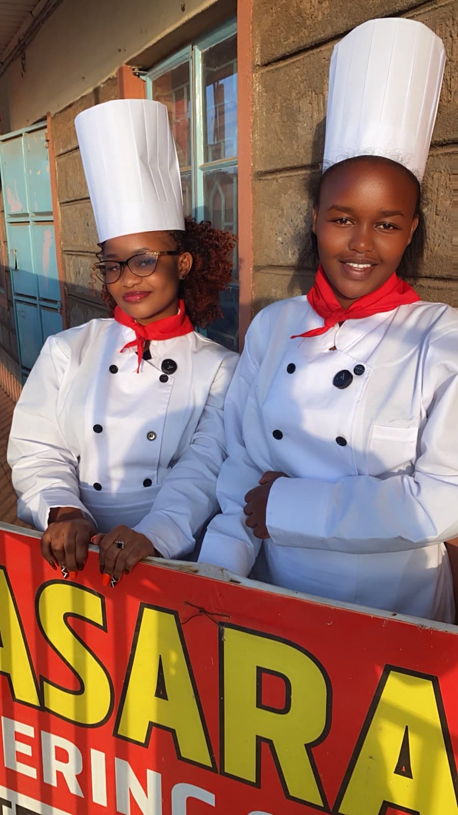 Front office and culinary students at the reception desk